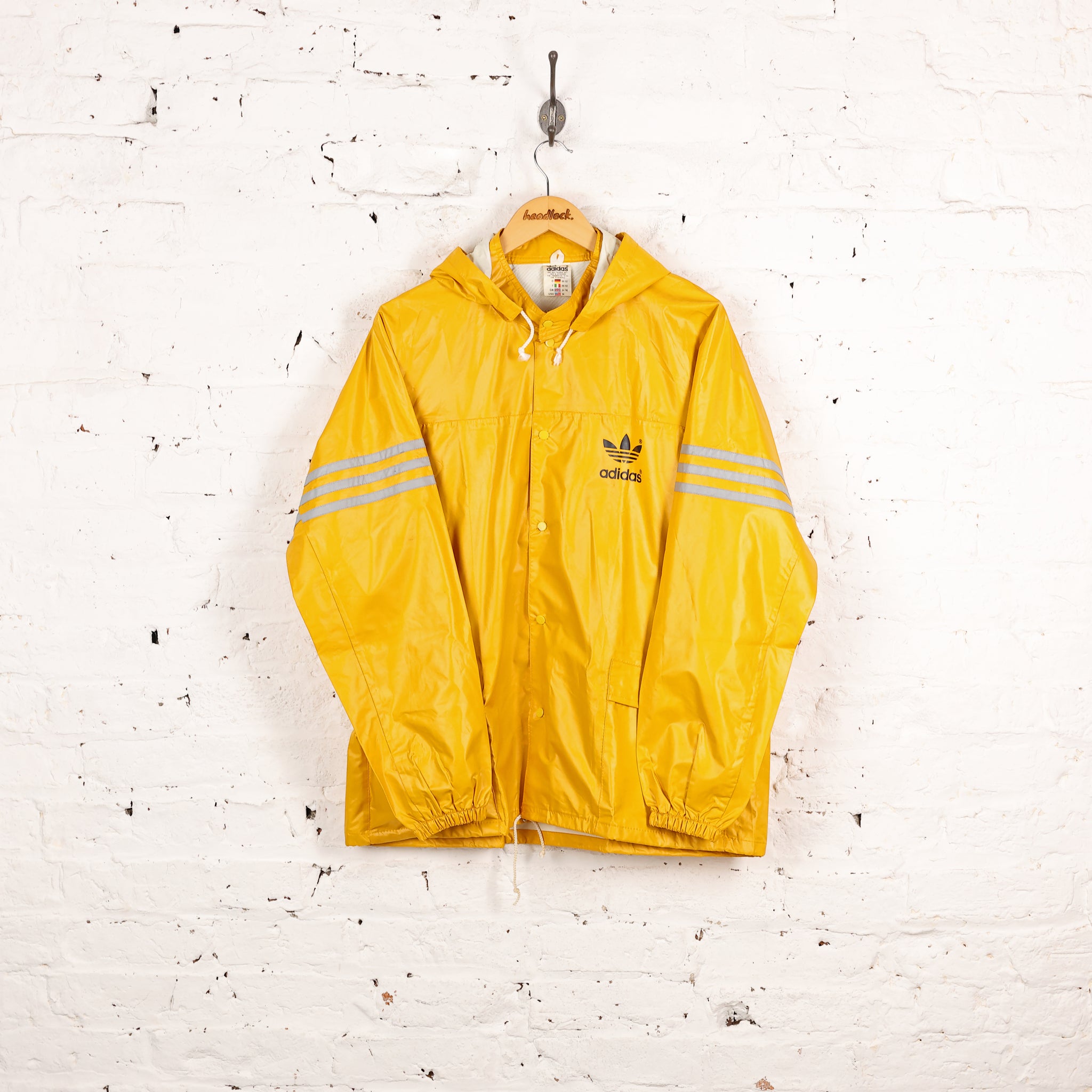 Adidas rain jacket yellow 2025