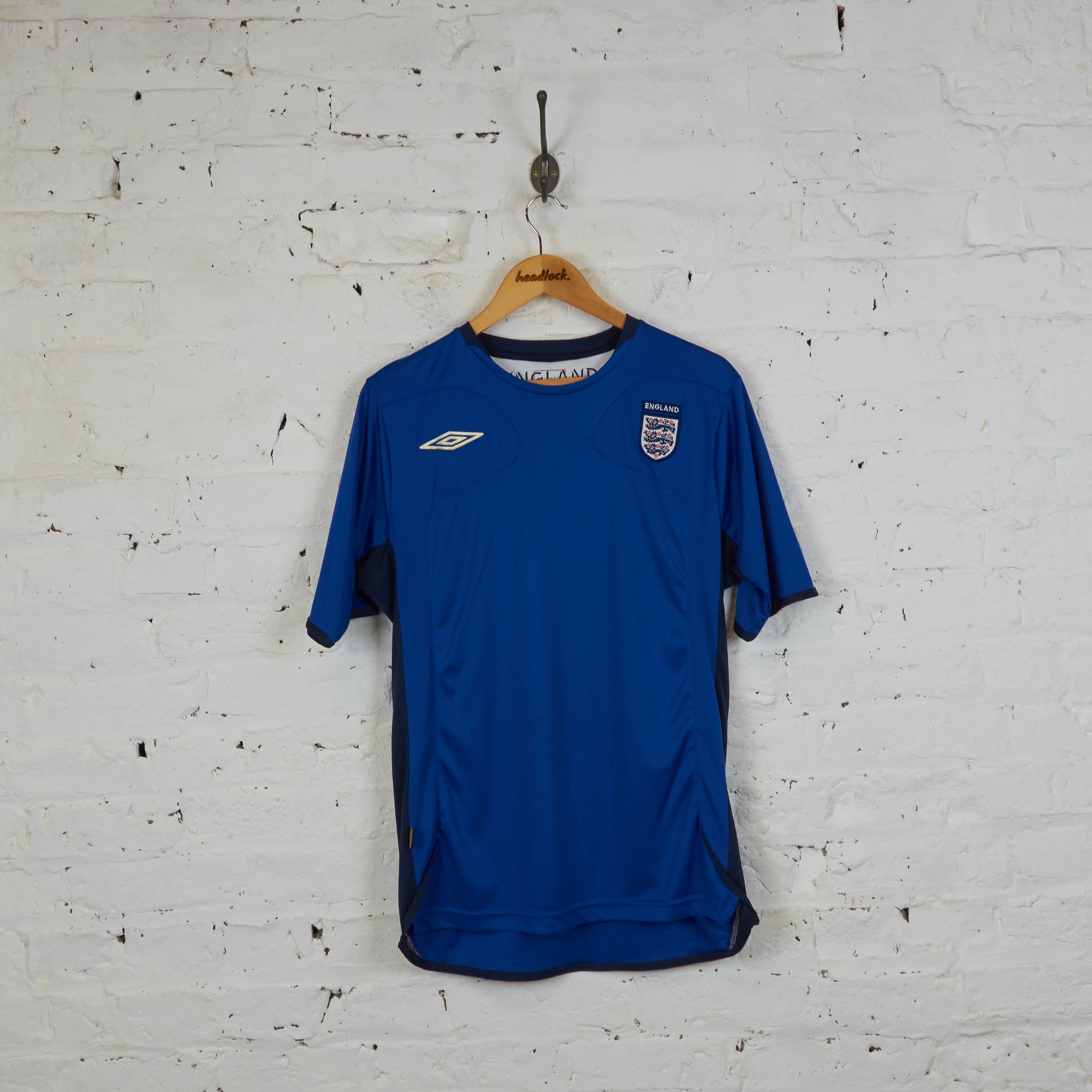 bovenstaand een paar Dodelijk Umbro England Football Training Shirt - Blue - M – Headlock